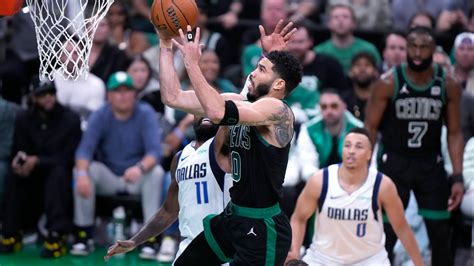 NBA Finals: Celtics beat Mavericks 105 .